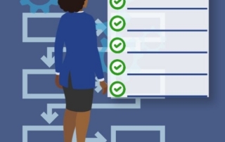 Woman standing looking at a checklist and flowchart